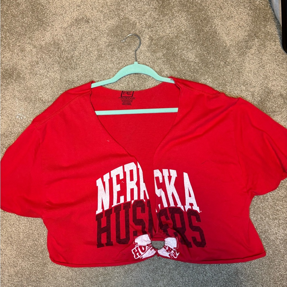 Nebraska husker cut shirt with ring on bottom